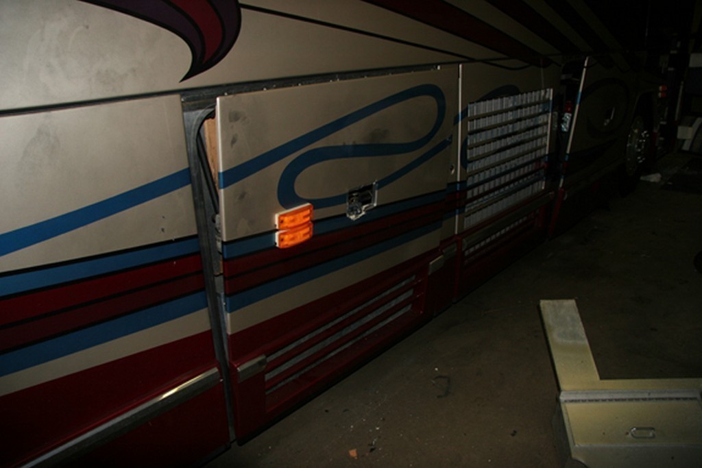 Prevost H3-40 Collision - Exterior bay door damaged