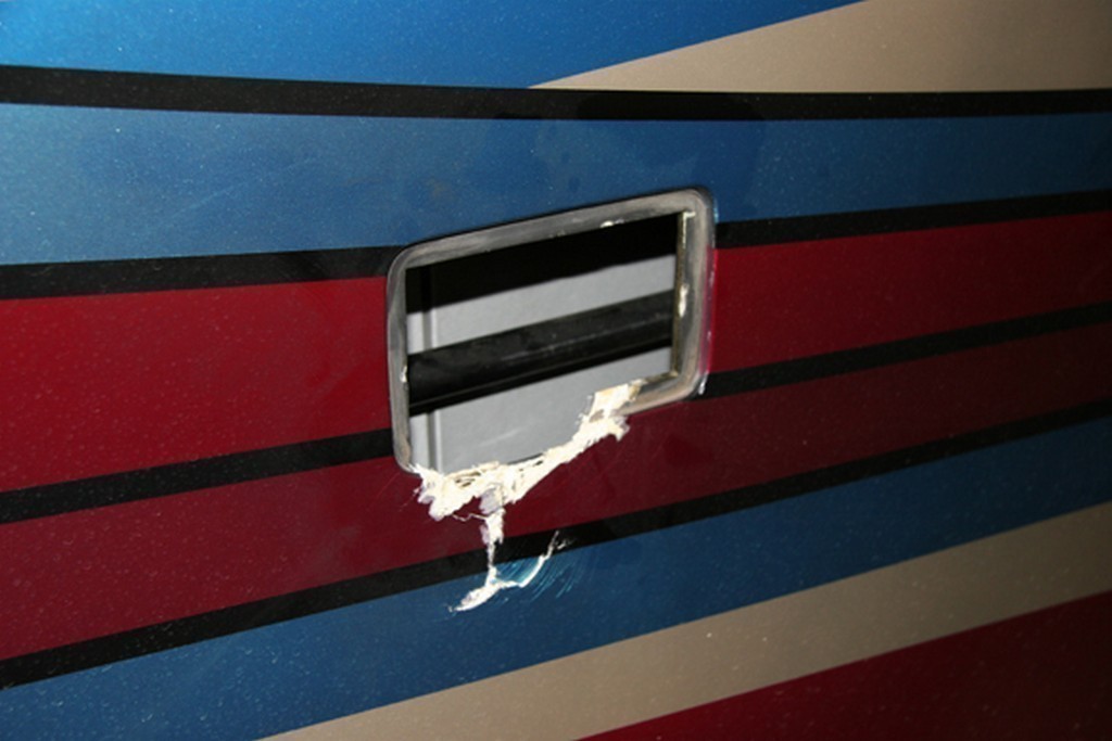 Prevost H3-40 Collision - Generator door damaged