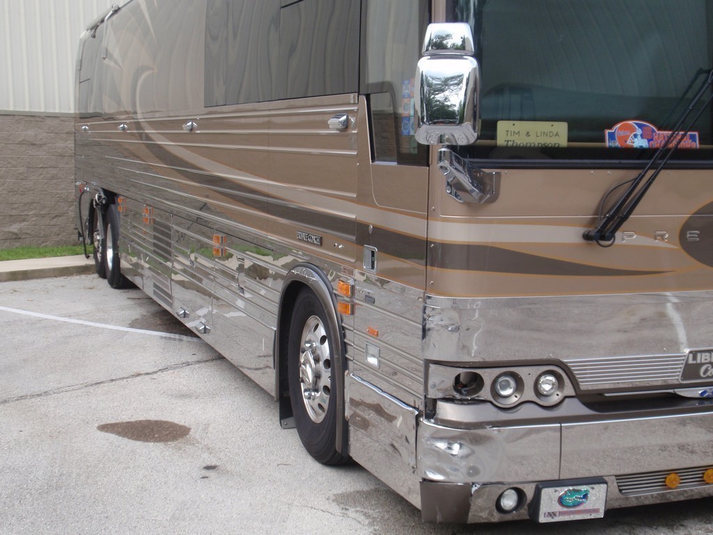 Prevost XL II Collision - Passenger side front corner damage before repairs by Excalibur Coach