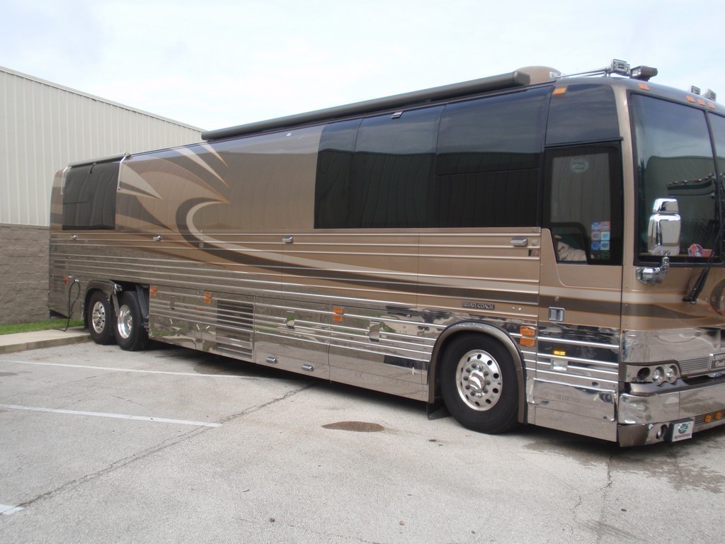Prevost XL II Collision - Passenger side damage before repairs by Excalibur Coach