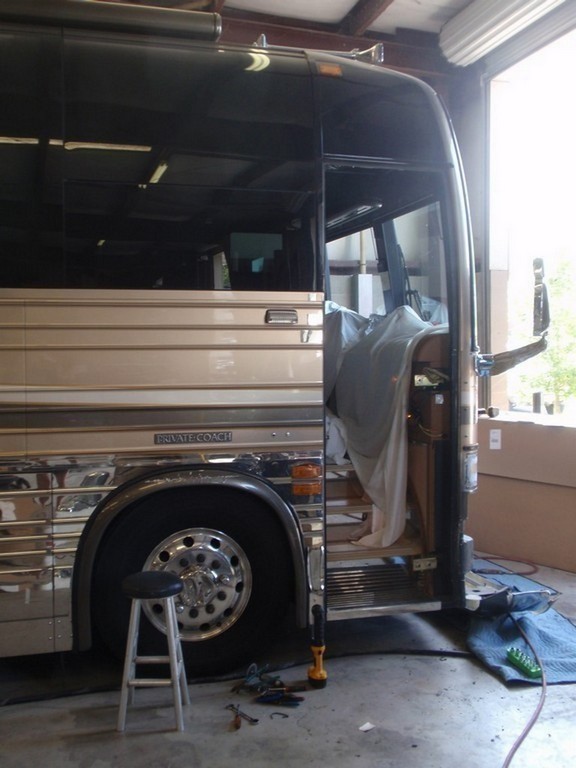 Prevost XL II Collision repairs in progress to front entry door by Excalibur