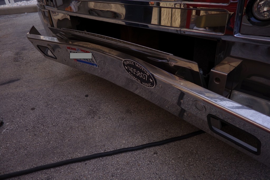 Prevost XL Royale with front bumper collision before Excalibur Coach repairs