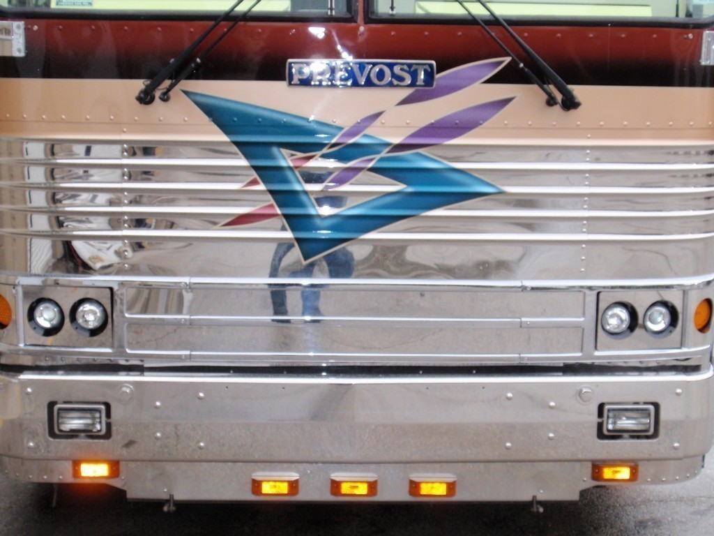 Prevost Country Coach Front headlight upgrade with stainless steel covers by Excalibur Coach