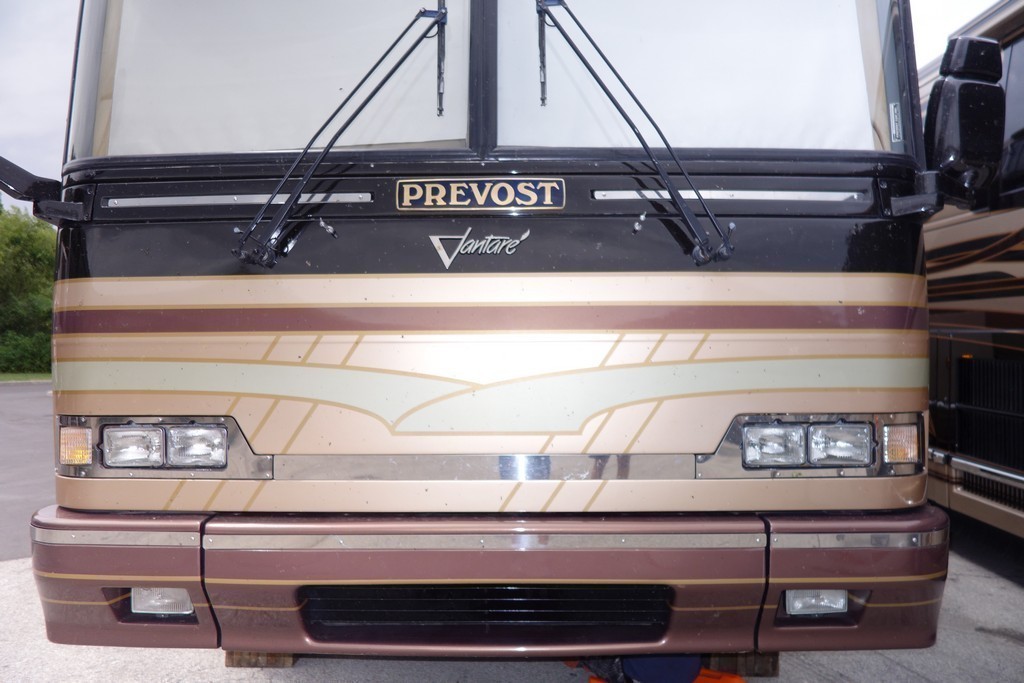 Prevost H3-45 Vantare Featherlite before Excalibur Coach headlight upgrade
