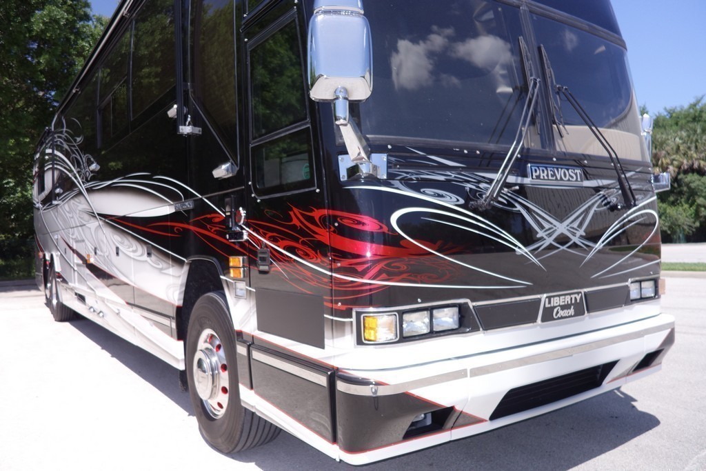 Prevost H3-45 Liberty Before Facelift by Excalibur Coach and new paint scheme