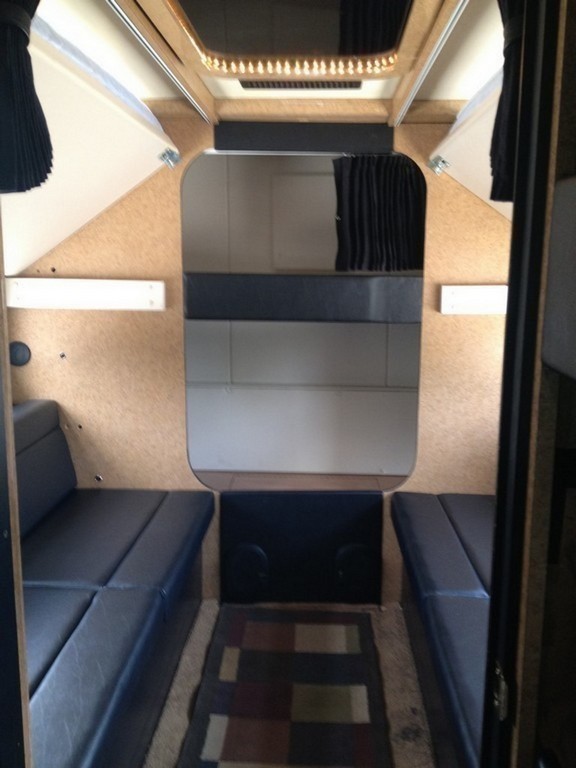 Prevost H3-45 Entertainer Bunk Coach Rear Salon Conversion by Excalibur Coach