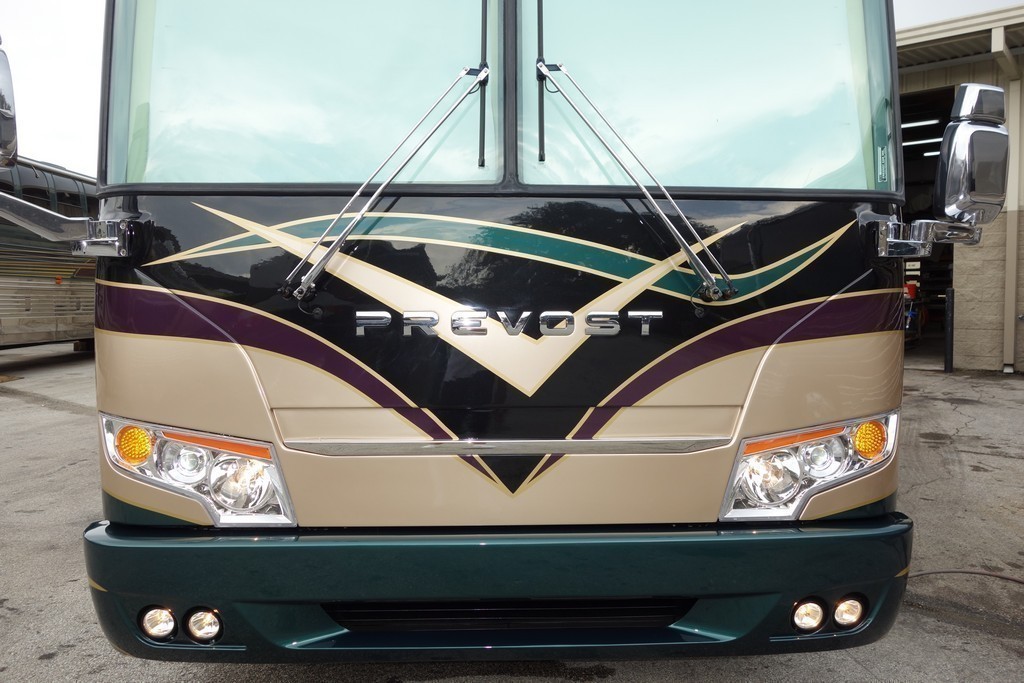 Prevost H3-45 Featherlite 2016 Facelift with new paint scheme by Excalibur Coach