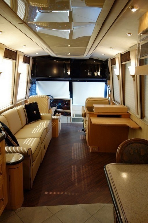Prevost 2000 Royale new upholstery on salon sofa new valances and new vinyl wood flooring by Excalibur Coach