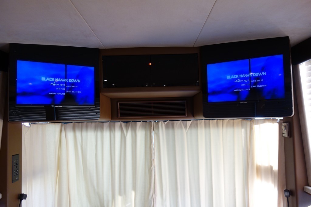 1995 Prevost H3 Motorhome Entertainer after front TV upgrade by Excalibur Coach