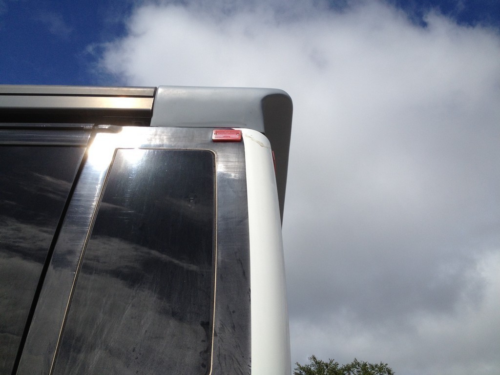 Prevost H3 rear awning in process by Excalibur Coach - Prevost Motorhomes - Entertainers - XL - XLII - H3-45 - Class A