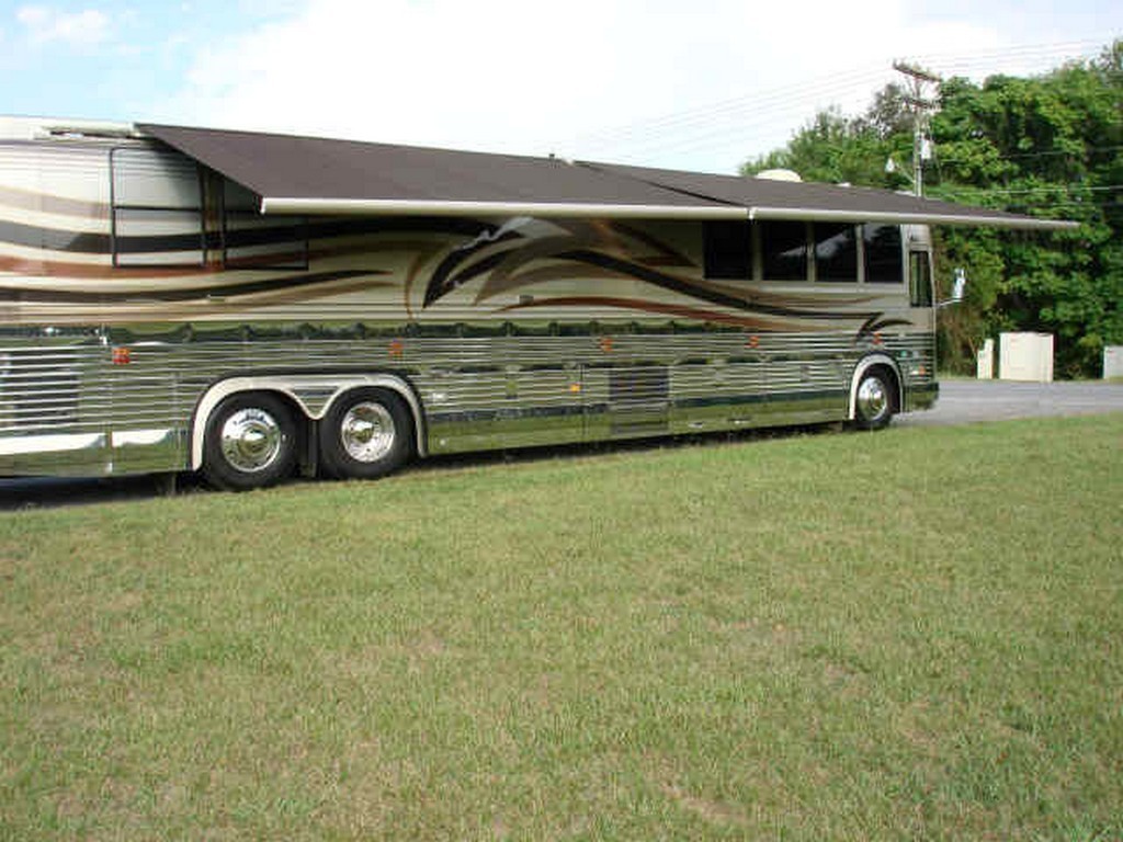 Prevost XL with passenger side awnings out installed by Excalibur Coach - Prevost Motorhomes - Entertainers - XL - XLII - H3-45 - Class A