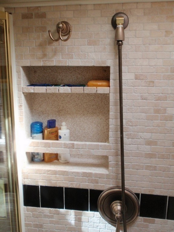 Prevost XL Marathon with Excalibur Coach inset shelving in newly remodeled stone shower - Motorhomes - Entertainers H3-45 XL XLII