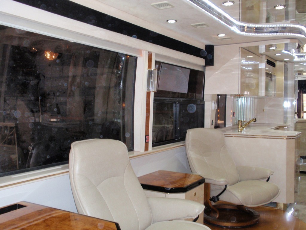 Prevost H3-45 Salon refurbished by Excalibur Coach after interior fire and soot damage
