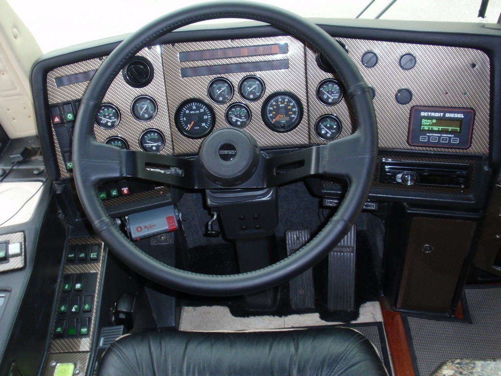 Prevost - New carbon fiber dash with black steering wheel by Excalibur Coach