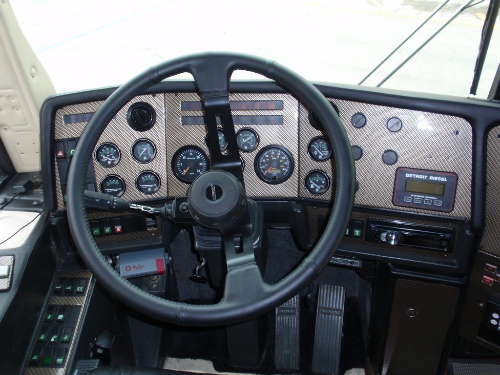 Prevost - New carbon fiber dash with black steering wheel by Excalibur Coach