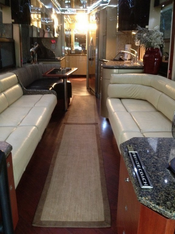 Prevost New wood flooring finished with throw rugs down Salon complete by Excalibur Coach - Floor - Prevost Motorhome - H3-45 - XL- XLII