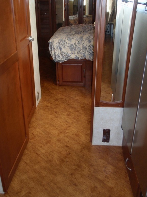 Monaco with New Vinyl Wood planking in Hallway by Excalibur Coach - Floor - Prevost Motorhome - H3-45 - XL - XLII - Marathon - Entertainer