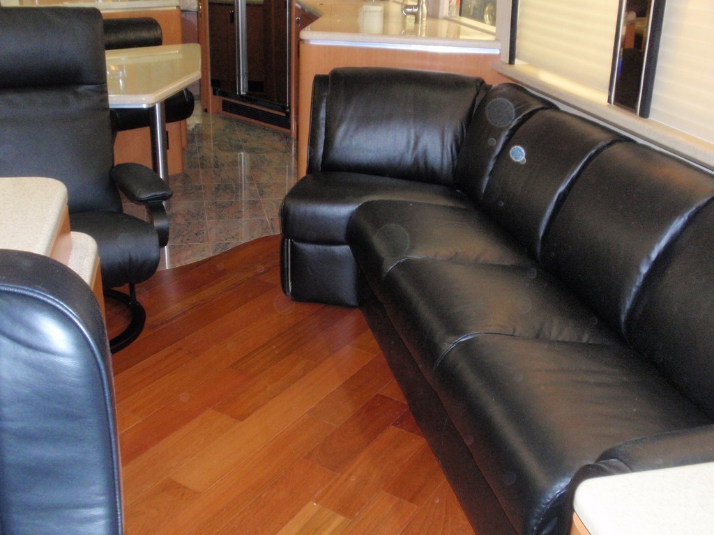 Prevost XL New Wood Floor in Salon by Excalibur Coach - Prevost Motorhome H3-45 - XL - XLII - Entertainer - Class A