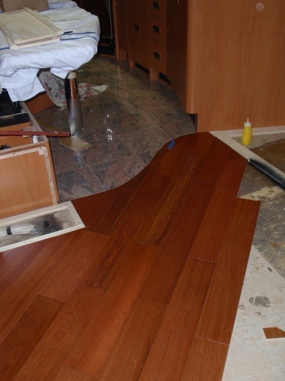 Prevost XL New Wood Floor being installed in Salon by Excalibur Coach - Prevost Motorhome H3-45 - XL - XLII - Entertainer - Class A