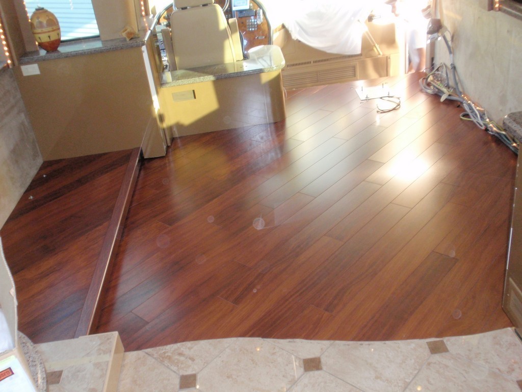 Prevost XL II H3-45 Motorhomes Class A New wood floor transition salon to galley by Excalibur Coach