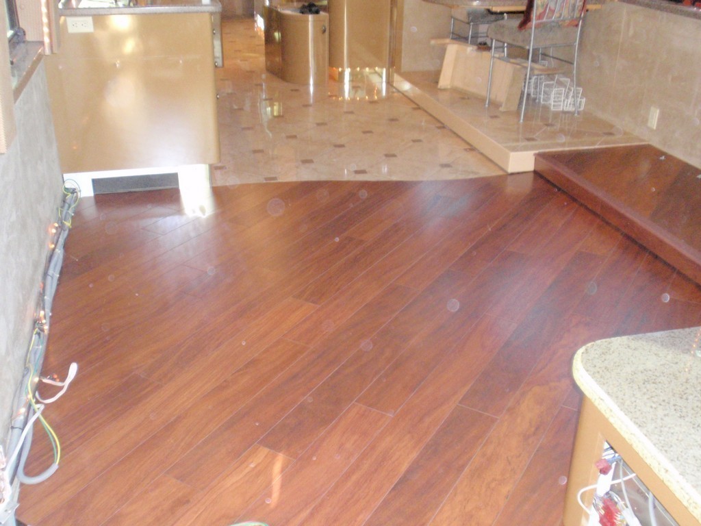 Prevost XL II H3-45 Motorhomes Class A - new wood floor in salon by Excalibur Coach