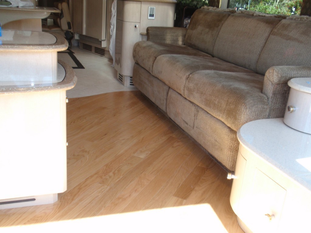 Prevost H3-45 XLII Motorhomes Class A - New wood floor in Salon by Excalibur Coach
