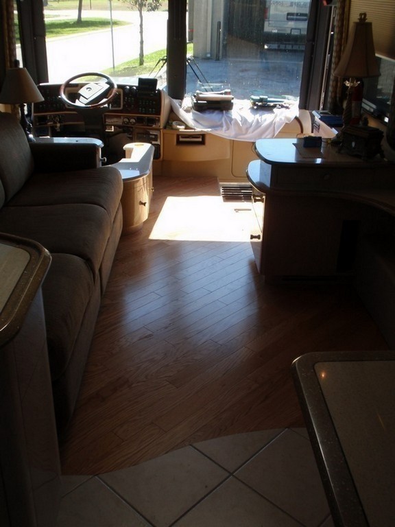 Prevost H3-45 XL II Motorhomes Class A - New wood floor in salon by Excalibur Coach Galley View