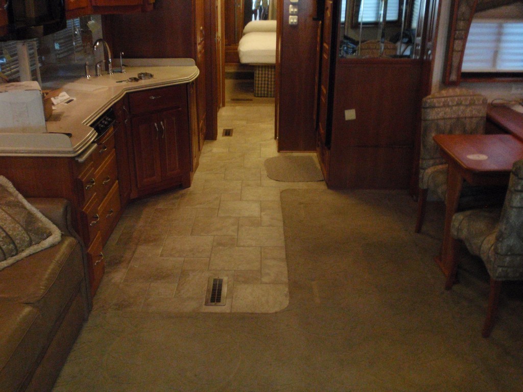 Monaco flooring before new heated porcelin flooring through out coach