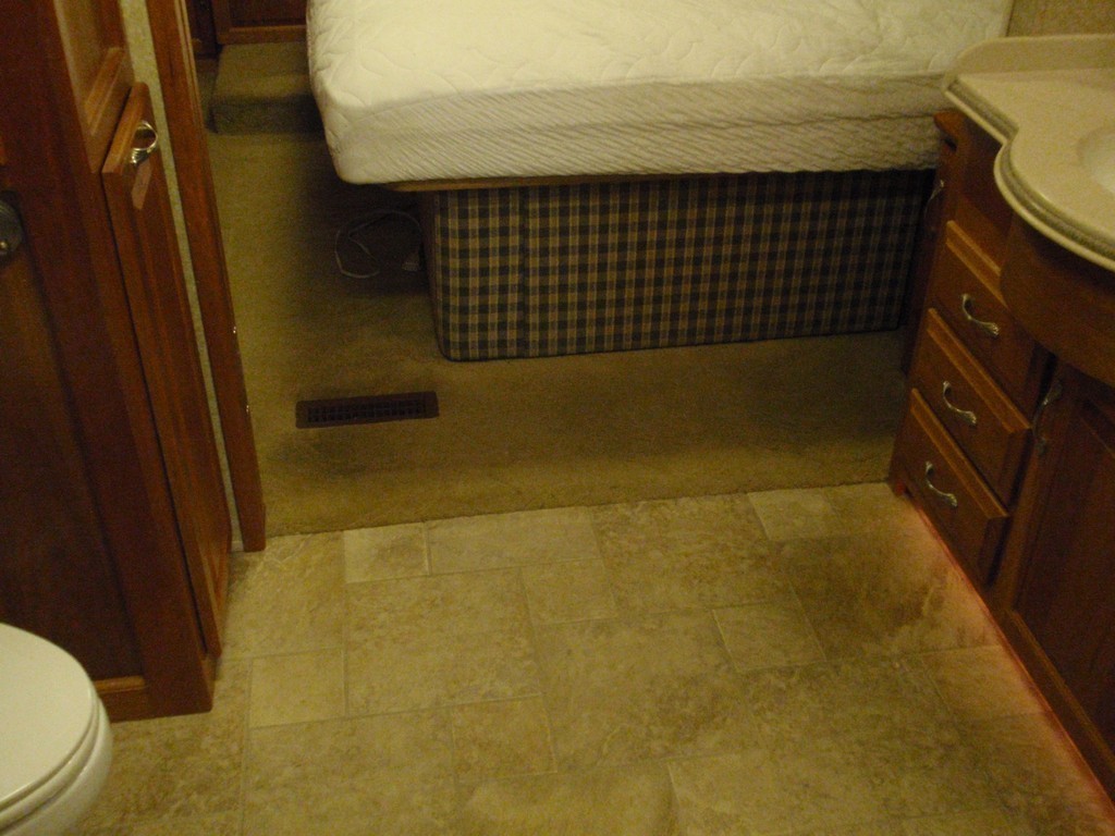 Monaco bedroom before new porcelin flooring