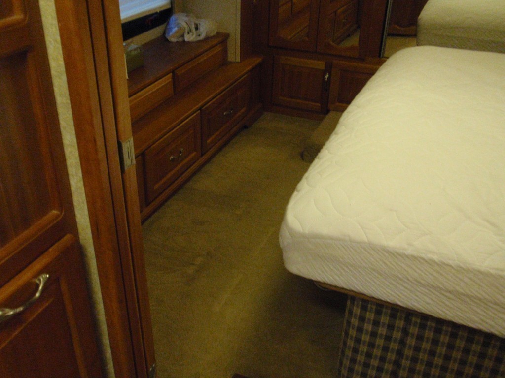 Monaco bedroom before new porcelin flooring