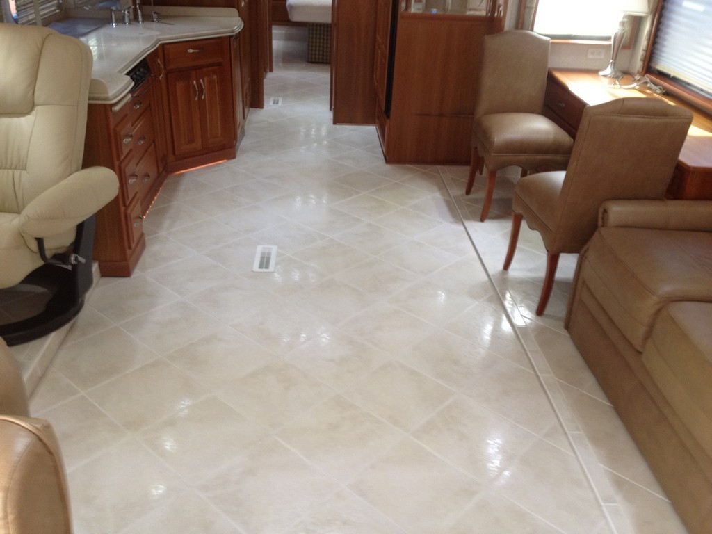 Prevost Monaco with new porcelin flooring in salon by Excalibur Coach - Prevost Motorhome H3-45 - XL - XLII - Entertainer - ClassA