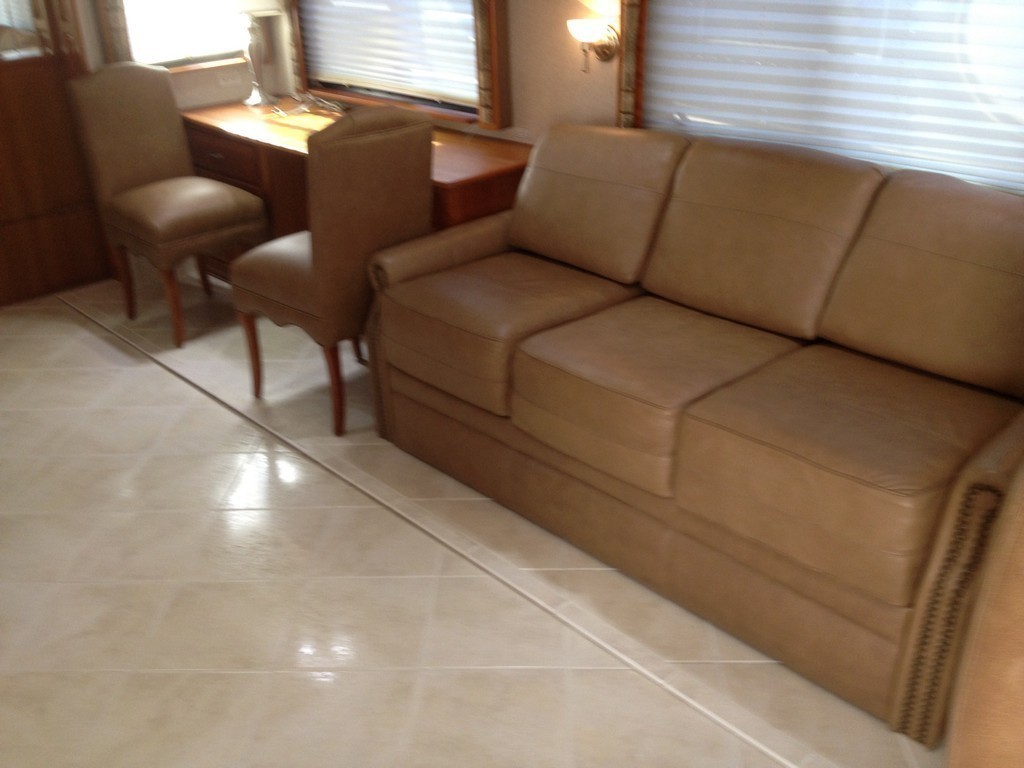 Prevost Monaco with new porcelin flooring in salon by Excalibur Coach - Prevost Motorhome H3-45 - XL - XLII - Entertainer - Class A