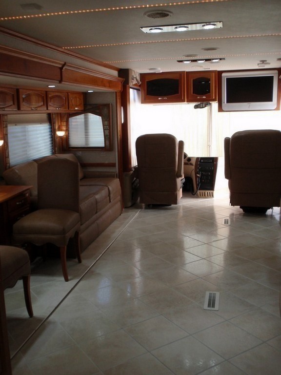 Prevost Monaco with new porcelin flooring in salon by Excalibur Coach - Prevost Motorhome H3-45 - XL - XLII - Entertainer - Class A