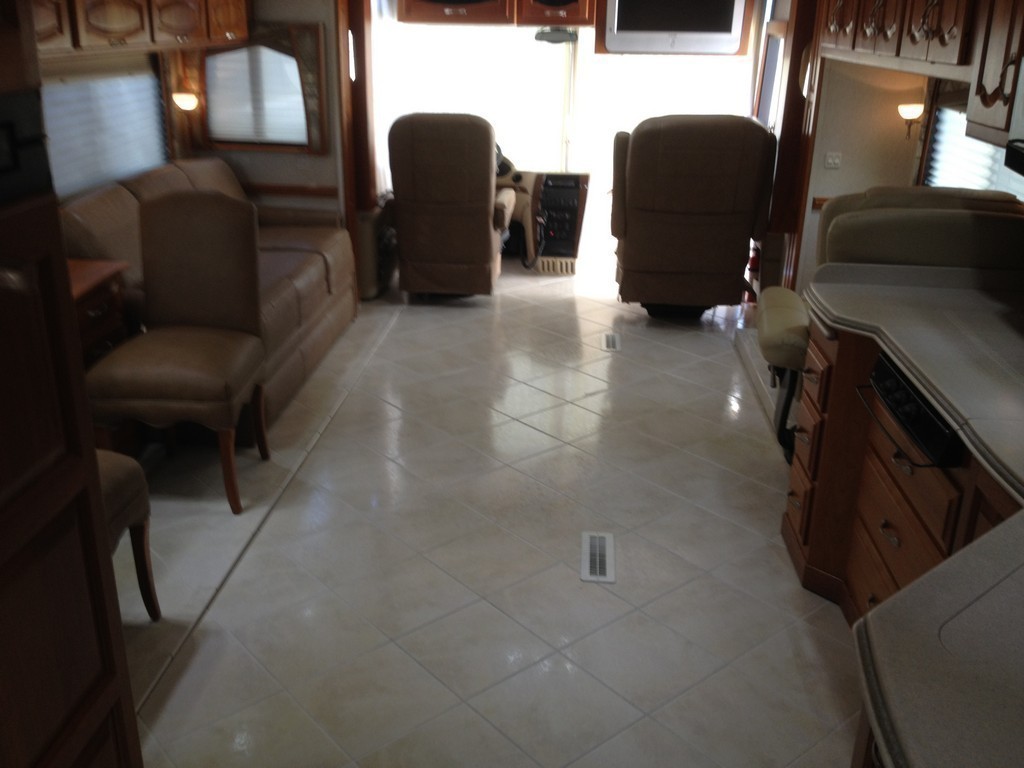 Prevost Monaco with new porcelin flooring in salon by Excalibur Coach - Prevost Motorhome H3-45 - XL - XLII - Entertainer - Class A