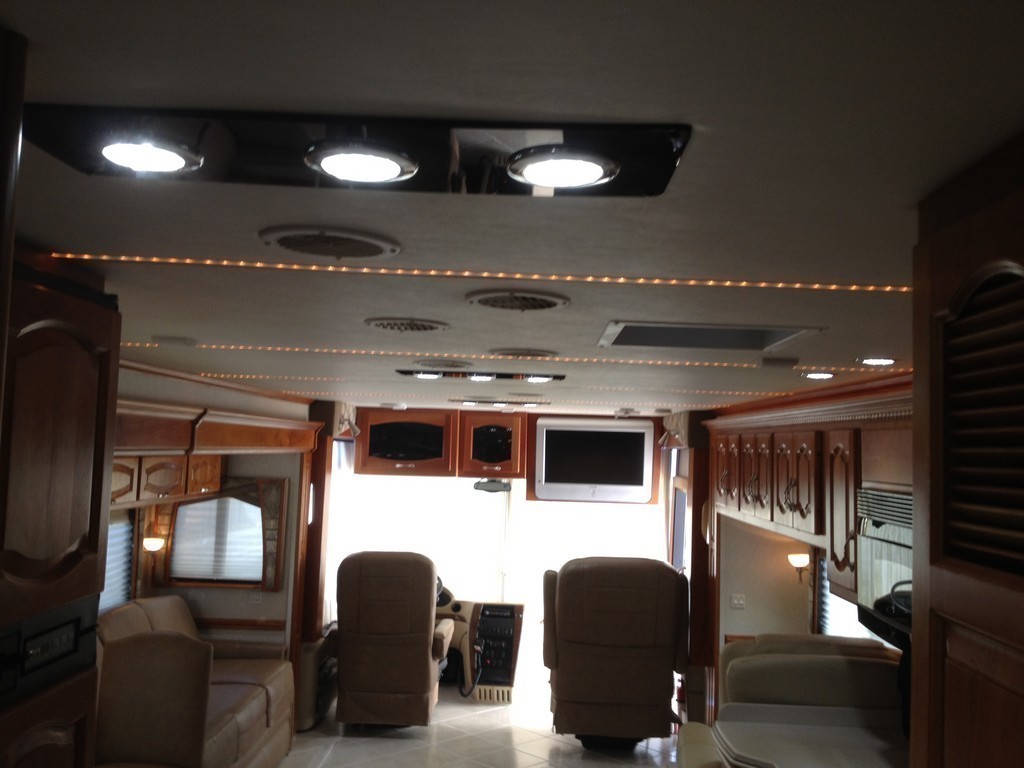 Prevost Monaco with new porcelin flooring in salon by Excalibur Coach - Prevost Motorhome H3-45 - XL - XLII - Entertainer - Class A