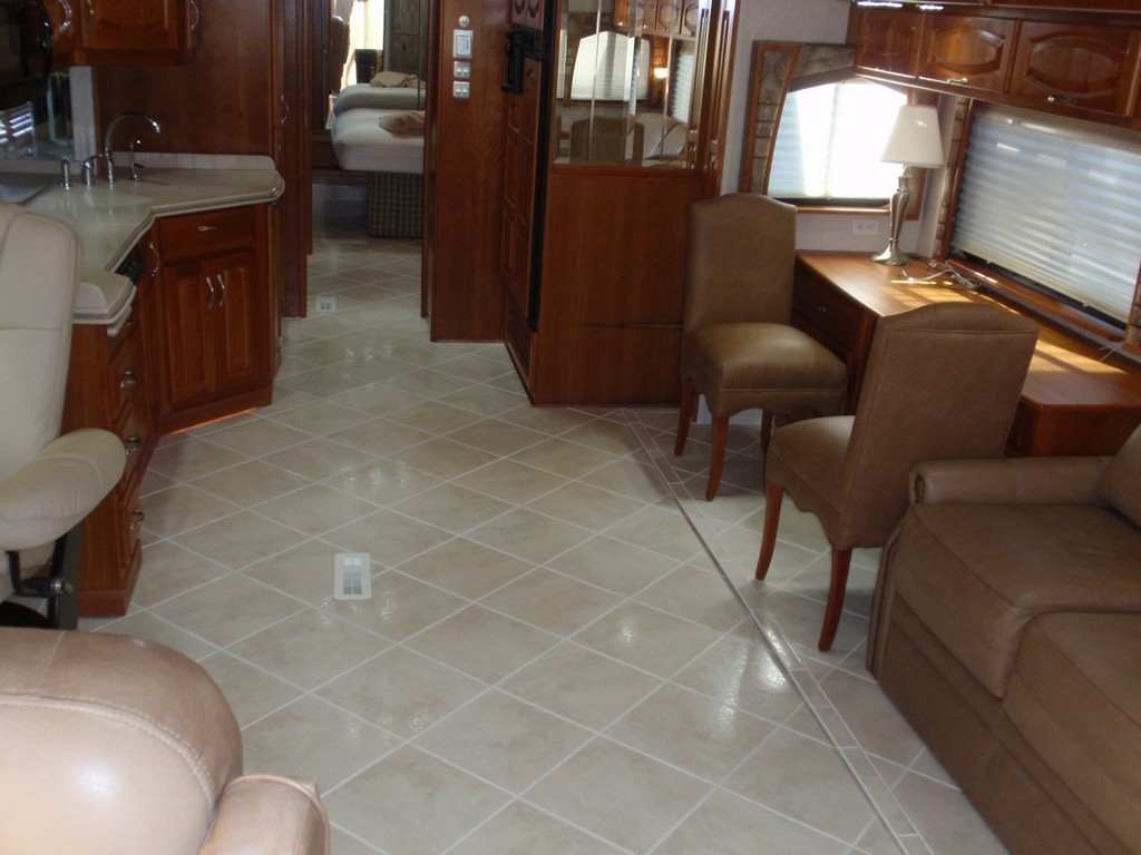 Prevost Monaco with new porcelin floor in salon-galley by Excalibur Coach - Prevost Motorhome H3-45 - XL - XLII - Entertainer - Class A