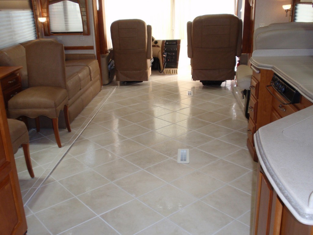 Prevost Monaco with new porcelin floor in salon-galley by Excalibur Coach - Prevost Motorhome H3-45 - XL - XLII - Entertainer - Class A