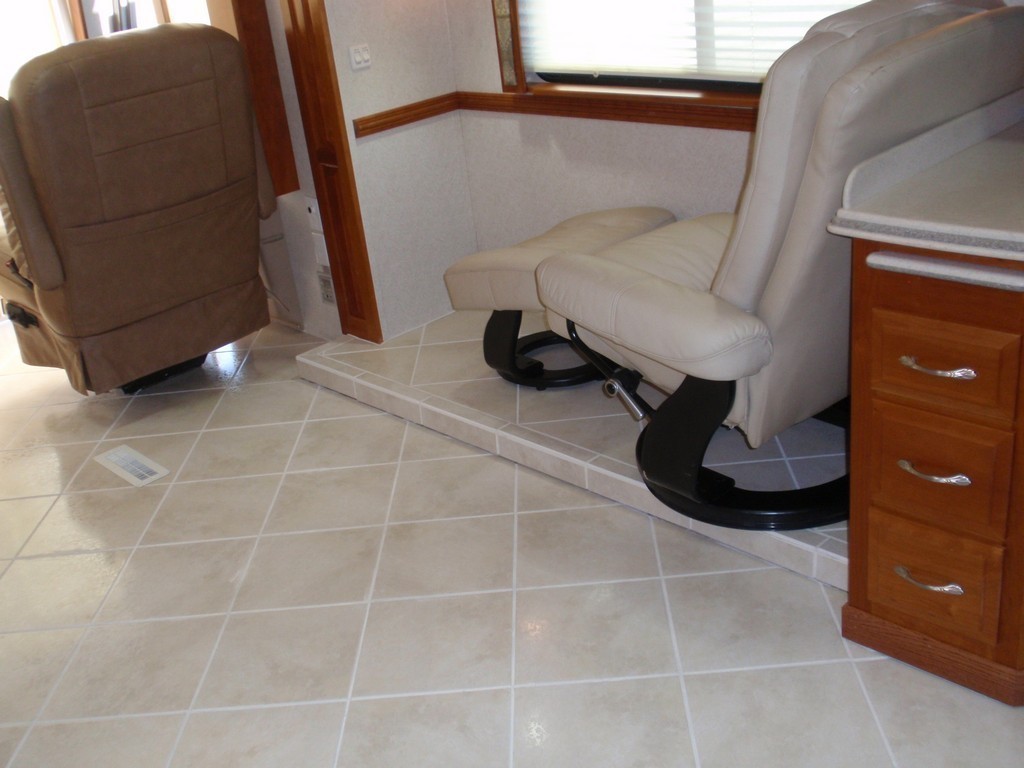 Prevost Monaco passenger side salon new porcelin flooring by Excalibur Coach - Prevost Motorhome H3-45 - XL- XLII - Entertainer - ClassA