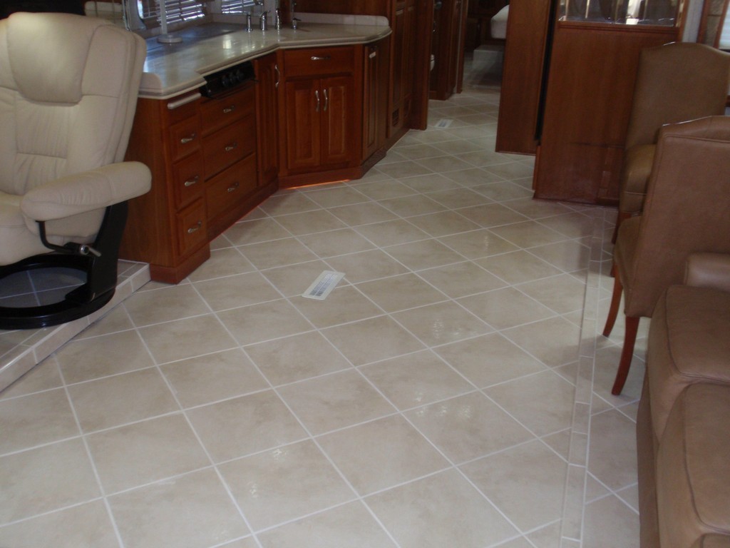 Prevost Monaco with new porcelin floor in salon-galley by Excalibur Coach - Prevost Motorhome H3-45 - XL - XLII - Entertainer - Class A