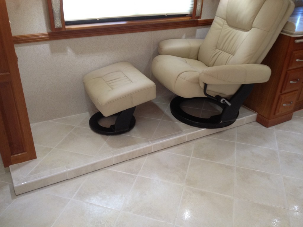 Prevost Monaco passenger side salon new porcelin floor by Excalibur Coach - Prevost Motorhome H3-45 - XL - XLII - Entertainer - Class A
