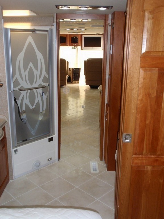 Prevost Monaco with new heated porcelin flooring through out coach by Excalibur Coach - Prevost Motorhome H3-45 - XL- XLII - Entertainer