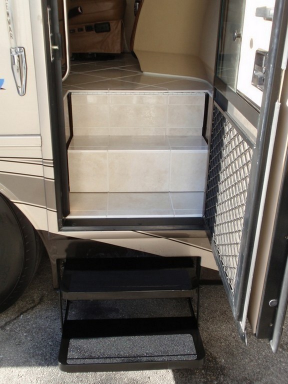 022Prevost Monaco New porcelin floor on stairwell by Excalibur Coach - Prevost Motorhome H3-45 - XL - XLII - Entertainer - Class A