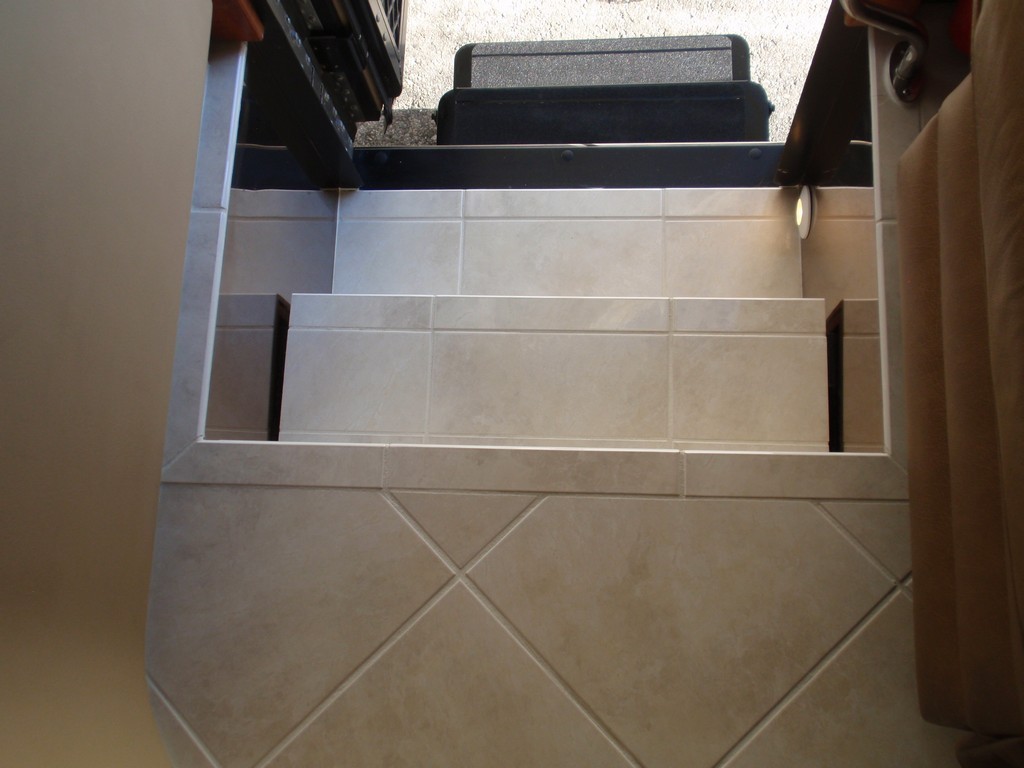 Prevost Monaco - New porcelin flooring on entrance steps by Excalibur Coach - Prevost Motorhome H3-45 - XL - XLII - Entertainer - ClassA