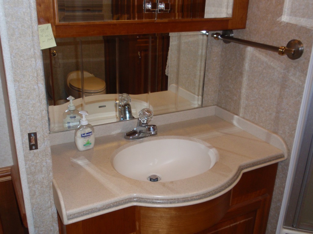 Vanity sink before new modern sink by Excalibur Coach