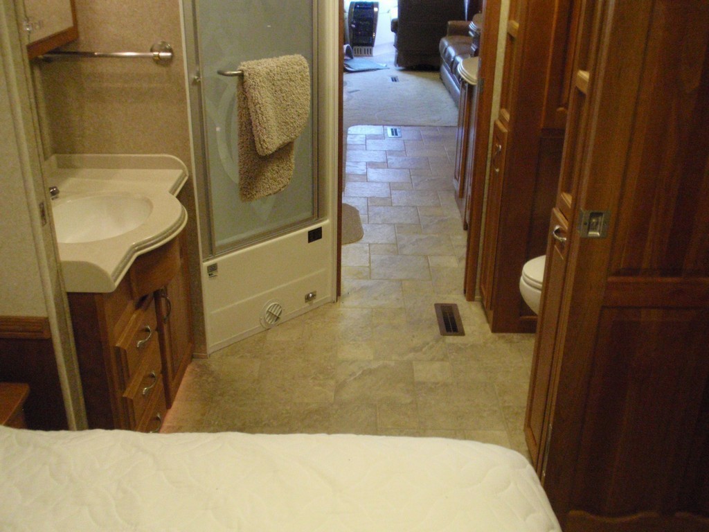 Vanity bathroom before new sink and flooring