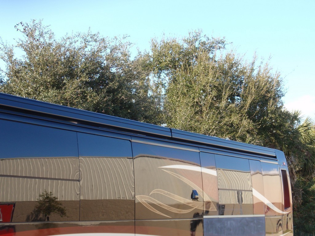 View From Ground with railing folded down - Prevost, H3-45, Motorhome -Observation deck on coach by Excalibur Coach