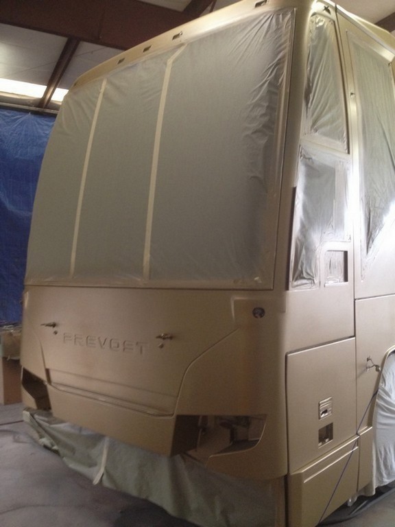 Prevost H3-45 XL XLII Motorhome - New paint in process by Excalibur Coach front view