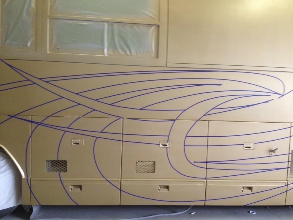Prevost H3-45 XL XLII Motorhome -New paint and graphics on front by Excalibur Coach