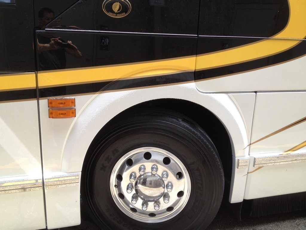 Prevost H3-45 Fender skirt and larger front tires upgrade by Excalibur