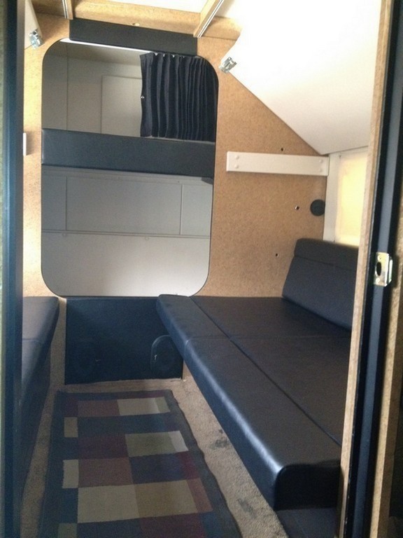 Prevost H3-45 Entertainer Bunk Coach Rear Salon Conversion by Excalibur Coach